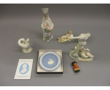 Four various Lladro figures, a Nao group, a boxed Wedgwood small dish and a composite figure of John Bull 