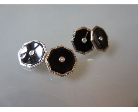 Pair of early 20th Century gold black onyx and diamond set cufflinks 