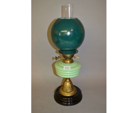 Victorian green opaque glass and brass oil lamp 