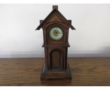 Late 19th Century Continental walnut and gilt decorated mantel clock with enamel dial and Arabic numerals 