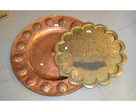Large circular copper table top embossed with birds, together with an Indian brass table top engraved with figures 