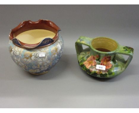 Continental Faience two handled pottery vase painted with flowers together with a Royal Doulton stoneware jardiniereFaience h