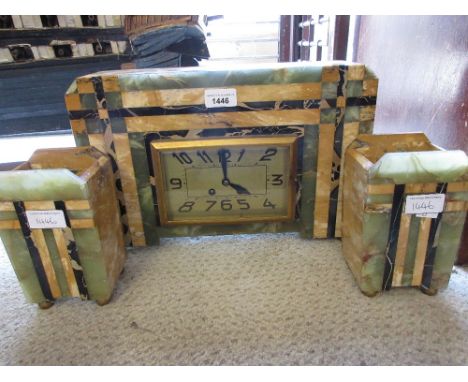 Art Deco green and yellow onyx cased mantle clock of rectangular form, the gilt dial with Arabic numerals and two train movem