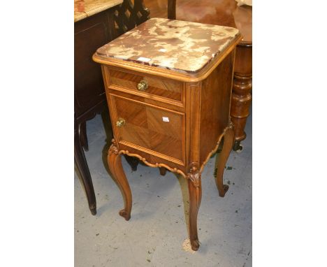 Pair of 19th Century French walnut marble top bedside cabinets with single drawer above panel door, raised on carved cabriole