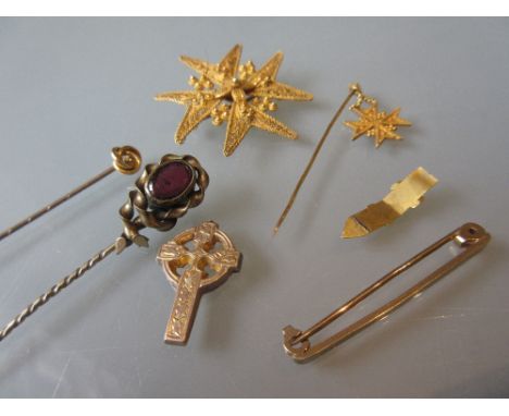 9ct Gold tie-pin, a Maltese cross brooch, Maltese cross stick pin, two other stick pins, a cross pendant and a gilt metal str