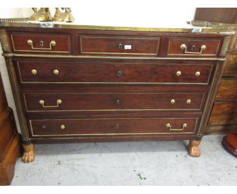 18th Century French directoire mahogany and brass mounted commode with grey flecked white marble top above three short and th