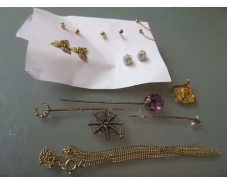 Three various Victorian stick pins, yellow metal pendant, silver gilt spider pendant on chain and a quantity of various stud 