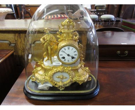Gilt metal figural mantel clock in the form of a huntsman, the dial signed Prat a Chinon, beneath a glass dome 