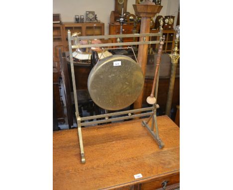 Brass floor standing dinner gong (one finial at fault) 