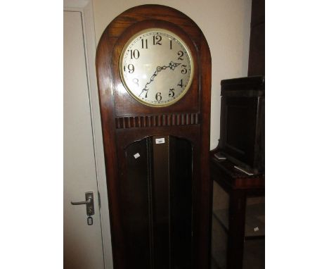 1920's Oak longcase clock, the circular silvered dial with Arabic numerals with a three train weight driven movement 