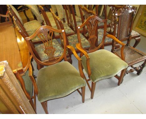 Reproduction yew wood dining room suite comprising: set of eight (six plus two) shield back chairs, a two pillar dining table