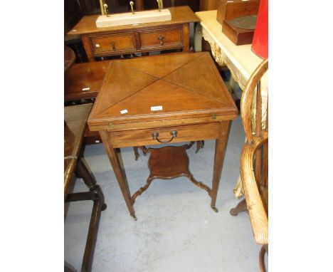 Edwardian mahogany and satinwood crossbanded envelope card table with single drawer having brass swan neck handle, raised on 