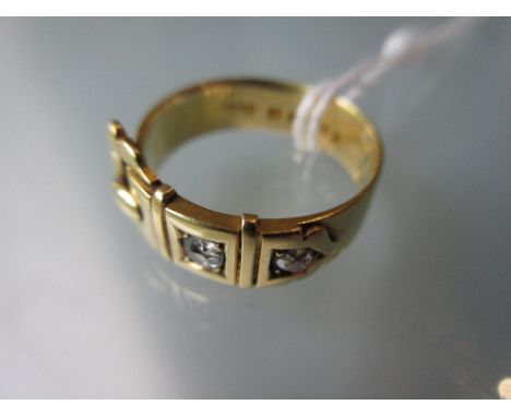 18ct Yellow gold and diamond set buckle design ring5g. Diamonds are not chipped. All over light scratching, otherwise good. 