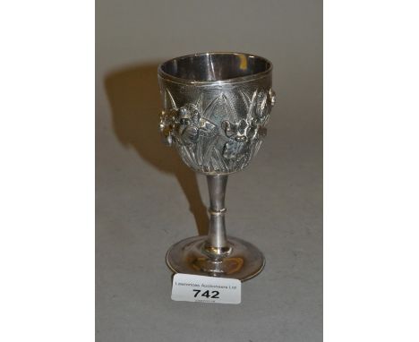 Japanese white metal goblet, the bowl heavily embossed with Iris, with character mark to base and stamped K & Co. (at fault) 