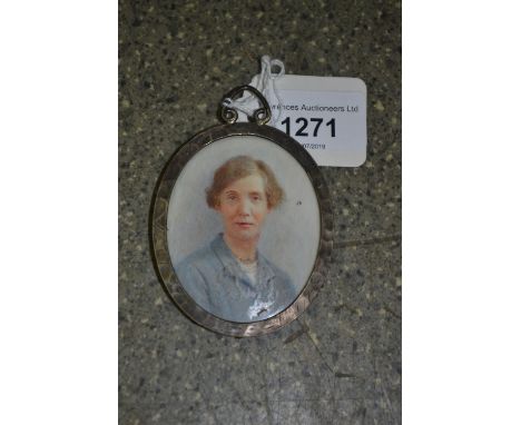 20th Century pewter framed oval portrait miniature head and shoulder portrait of an elderly lady, 2.25ins x 2ins 