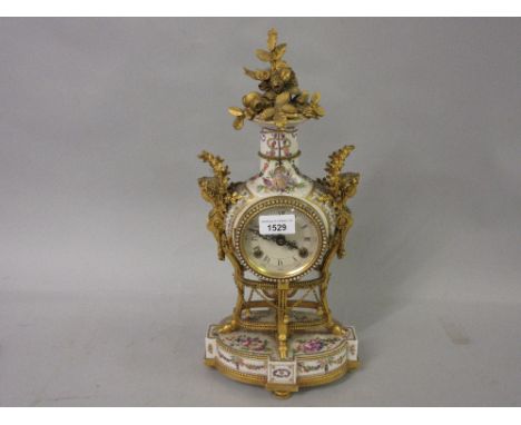 Reproduction French style porcelain and gilt metal two train mantel clock 