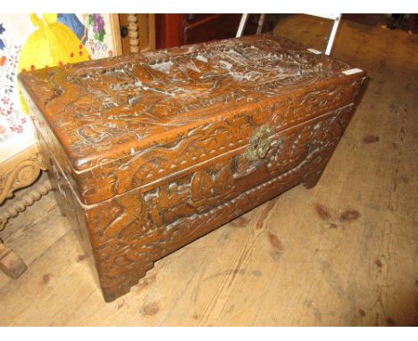 Chinese carved hardwood trunk, 16ins high x 29ins wide 