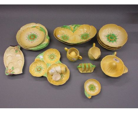 Quantity of Carltonware buttercup pattern dishes, toast rack, orange squeezer and two jugs 
