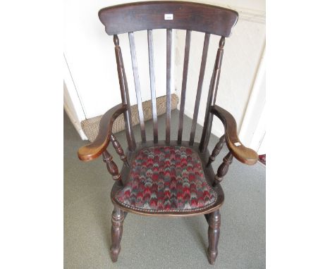 Reproduction stained pine and beechwood slat back farmhouse kitchen chair together with a carved oak firescreen inset with a 