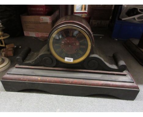 Large 19th Century black slate and rouge marble drum form mantel clock, the black slate and rouge marble dial with Roman nume