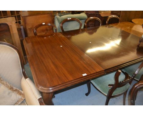 Good quality Victorian mahogany pull-out extending dining table with two extra leaves raised on cabriole supports with brass 