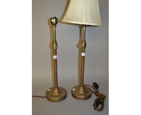 Pair of adjustable brass table lamps and a similar standard lamp (table lamps both at fault) 