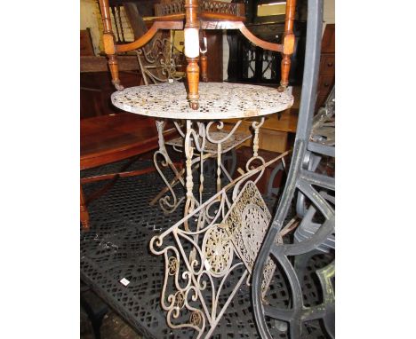 Small circular metal garden table and a pair of matching folding chairs 