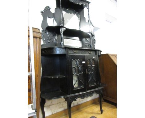 Edwardian ebonised mirror back chiffonier with a two door base on cabriole supports 