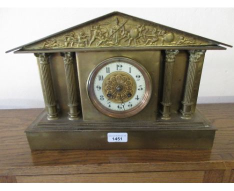 19th Century French gilt brass cased mantel clock of neo classical design with a relief frieze above two pairs of Corinthian 