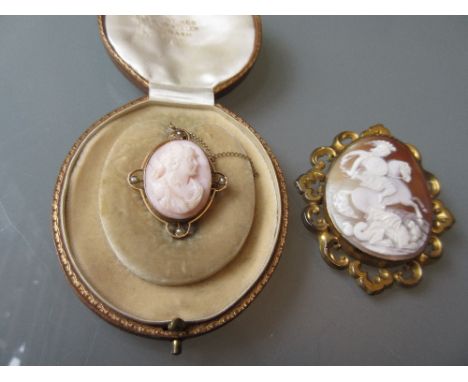 Carved cameo portrait pendant / brooch in a 9ct gold seed pearl mount suspended from a 9ct gold chain, together with another 