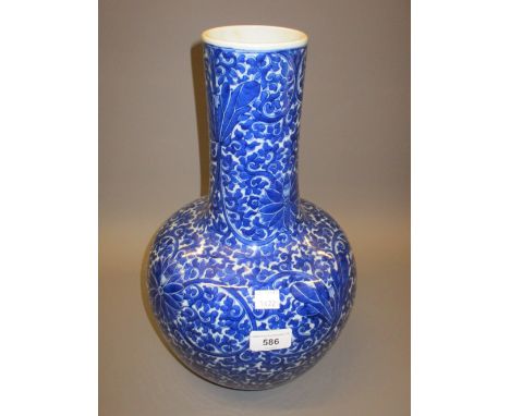 Large Chinese porcelain bottle vase, all-over floral decorated in blue and whiteIn good condition.  15ins tall 