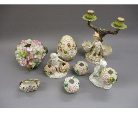 Late 19th Century porcelain floral encrusted ball form vase together with six other similar vases and a Continental porcelain
