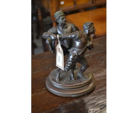 Emile Guillemin, brown patinated bronze group of two swordsmen, signed in the oval base (with damages), 9ins high 