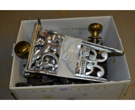 Pair of polished metal cherub design brackets, together with a quantity of metal window and door furniture 