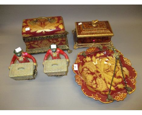 Reproduction ceramic and gilt casket, similar tazza, composition casket and pair of standing figures, each holding a gilt bas