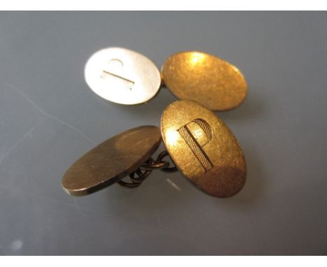 Pair of 9ct gold cufflinks, the oval heads engraved with the initial ' P '11g 