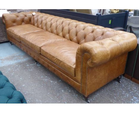 CHESTERFIELD SOFA, of very large proportions, buttoned brown leather, 300cm L x 95cm D x 82cm H.