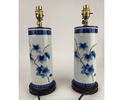 BRUSH POT TABLE LAMPS, a pair, Chinese blue and white ceramic with hardwood bases, 35cm H. (2)