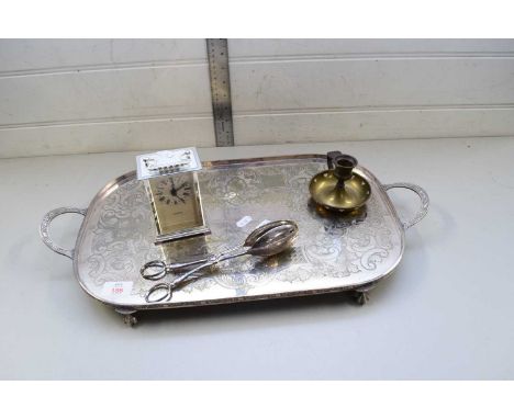 SILVER PLATED SERVING TRAY TOGETHER WITH SERVING TONGS, CHAMBER STICK AND A QUARTZ MOVEMENT CARRIAGE CLOCK