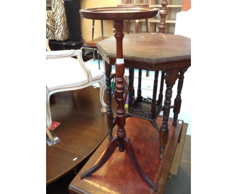 A REPRODUCTION TALL TRIPOD TABLE