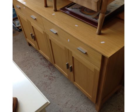 A MODERN LIGHT OAK SIDEBOARD