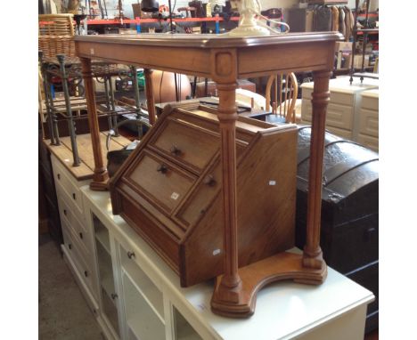 A GLASS TOP CONSOLE TABLE