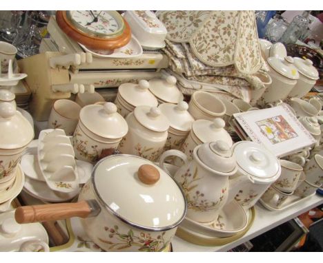 An extensive St Michael Pottery dinner tea and coffee service, decorated in the Harvest pattern, together with storage jars, 