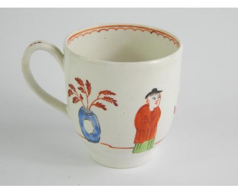 A First Period Worcester porcelain coffee cup, circa 1765, with strap handle, painted with Chinese figures.