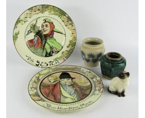 A pair of Royal Doulton Series Ware pottery plates, decorated with The Jester and The Hunting Man, Doulton Lambeth stoneware 