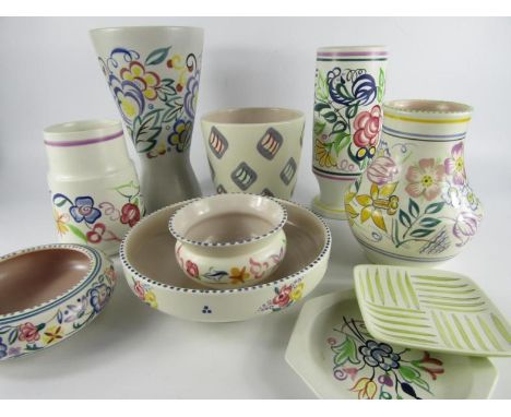 Poole pottery traditionally painted with flowers, or geometric motifs, late 20thC, comprising vases, dishes and bowls. (10)