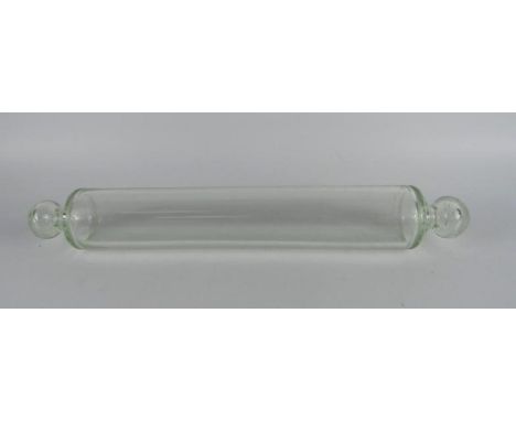 A Victorian clear glass rolling pin, 43cm long.