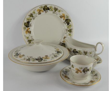 A Royal Doulton porcelain part dinner and tea service, decorated in the Larchmont pattern, comprising oval meat platter, pair