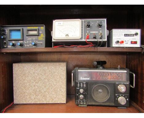 A Steepletone MBR-747 multiband radio, Daystron Ltd Heathkit voltmeter, Altai DC power supply unit, a battery tester 30KB and