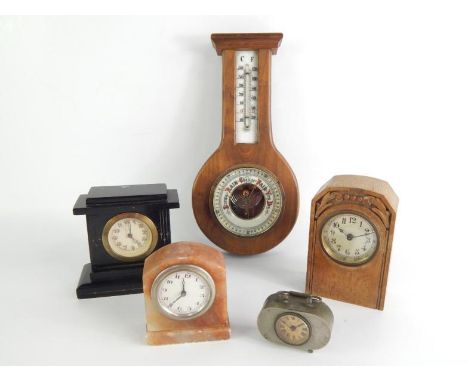 A Victorian barometer and thermometer, in a later olive wood case, 30cm long, on oak cased mantel clock, slate cased mantel c